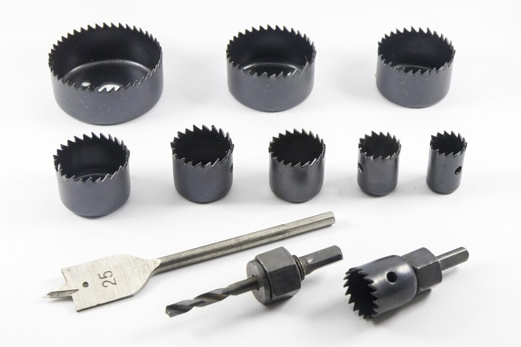 Set of hole saws in different diameters with a pilot drill and arbor