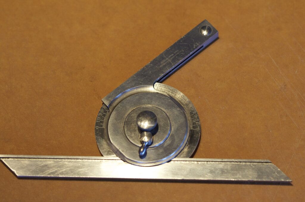 Steel universal bevel protractor for measuring and setting angles