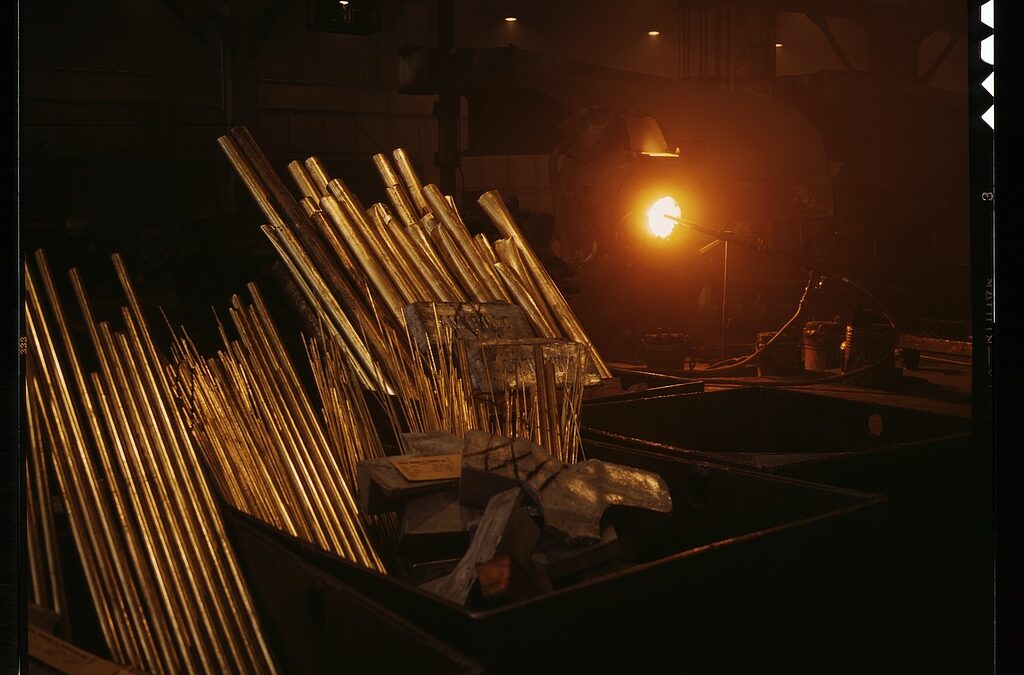 Racks of metal tubing in a 1940s aircraft factory